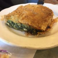 Spinach Pie · Baked fresh spinach, feta cheese and filo crust, with salad.