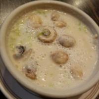 Tom Kha Khai Soup · Another Thai soup. Chicken in lemony coconut milk featuring fresh mushroom, lemon grass, cit...