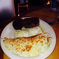 Steak and Eggs · Choice 8 oz. rib eye, grilled to your liking, and 2 eggs any style.