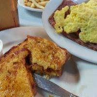 Two Scrambled Eggs with Cheese, and Bacon or Ham or Sausage · 