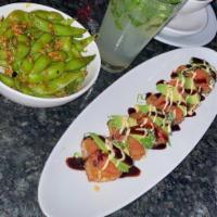 Spicy Tuna on Crispy Rice · 6 pieces. Spicy tuna (served cold) on rice cake with avocado, onion, jalapenos, mayo and eel...