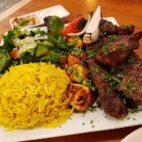 Lamb Chop · Lamb chops marinated with Mediterranean spices served with hummus.