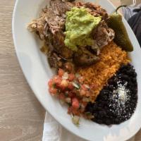 Carnitas · Chile and orange braised pork, guacamole, pico de gallo.