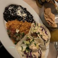 Fish Tacos · blackened rockfish, cilantro slaw, pineapple salsa, chipotle crema. Served a la carte, 2 tac...