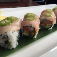 Crystal Roll · Spicy scallop, tobiko, avocado and crunch top with yellow tail, jalapeno and truffle olive o...