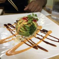Monkey Brain · Stuffed avocado with spicy tuna, seaweed salad and tobiko. Spicy.