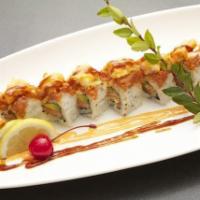 Lion King Roll · Salmon, crunch and avocado. Top: spicy tuna, shrimp tempura, chef's sauce.  Spicy.