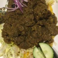 Beef Rendang · Tender beef chunks stew cooked in a rich thick coconut milk sauce with numerous exotic spice...