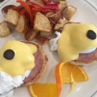 Eggs Benedict · Served with home fries, English muffin, Canadian bacon, & homemade Hollandaise.