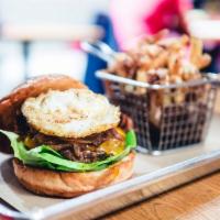 Bison Burger · Ground bison, bacon, cheddar cheese, bibb lettuce, tomato, caramelized onion, fried egg and ...