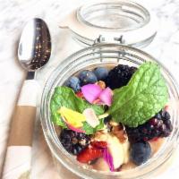 Overnight Oats · Chia pudding, homemade preserved fruit, flax seed and nuts. Vegetarian and gluten-free.