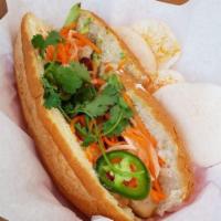 Lemongrass BBQ Chicken Banh Mi · Lemongrass chicken, mayonnaise, pickled daikon and carrots, cucumbers, jalapenos, cilantro, ...