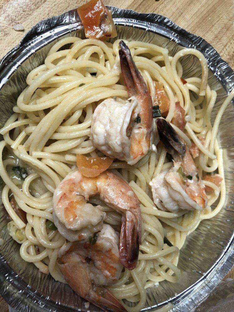 Shrimp Scampi · Spaghetti pasta with sautéed shrimp in a rich white wine garlic butter sauce.