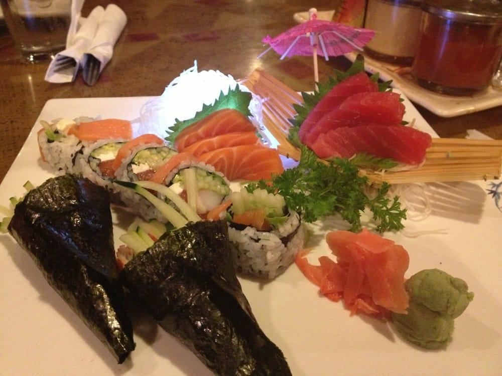 Deluxe Sushi Combo · Sashimi 4 pieces, chef's choice nigiri, 8 pieces, and house roll, 5 pieces.