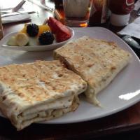 Breakfast Lavash · Scrambled eggs with tomato, green onions, mushrooms and feta cheese wrapped in lavash bread ...