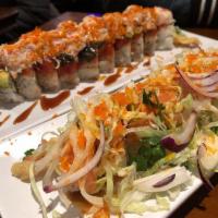 Golden Gate Roll · Crab meat, tempura shrimp inside, with salmon, tobiko, red onions, cilantro and  lettuce on ...