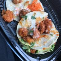 Honey Chipotle Shrimp Tacos · Three corn tortillas, cilantro, shredded carrots, celery, ranch dressing, and diced avocado....