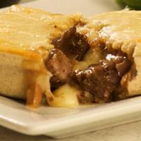 Steak and Cheese Pie · All natural sirloin beef chucks, slow roasted for 24 hours, surrounded in a rich gravy with ...
