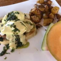 Dolci Cafe Benedict · English muffin, poached eggs, prosciutto, gorgonzola, spinach and pesto Hollandaise. Served ...