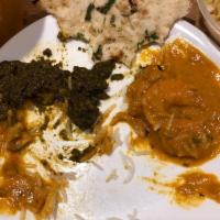 Lamb Saag · Lamb cooked with spinach, onions, garlic, ginger, cream, and spices.