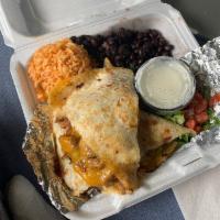 Quesadilla Platter · Our fresh quesadilla served with homemade rice and beans.