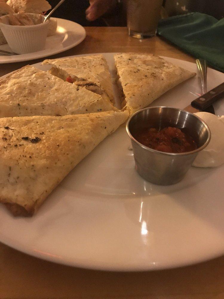 Quesadilla · Cheddar Jack, bell pepper and onion, and sour cream and salsa on the side.
