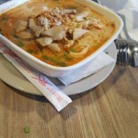 Tom Yum Soup · Spicy soup with mushroom, lemongrass, tomato, kaffir lime leaves, onion and galangal.