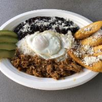 Pabellon Criollo · A delicious traditional Venezuelan dish made with white rice, seasoned shredded beef, fried ...