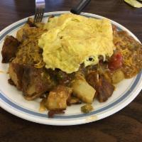 Train Wreck · 1/2lb hamburger patty on top of home fries, smothered in red or green chili, cheese and topp...