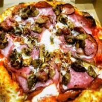 Meat Lovers Pizza · Pizza sauce, pepperoni, Canadian bacon, sausage, meatball, and salami