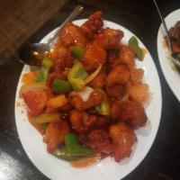 Sweet and Sour Pork · Deep-fried pork with bell peppers and pineapple in a house special sweet and sauce