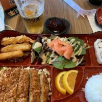 Tonkatsu Bento · Fried pork cutlet served with rice, miso soup, house salad, assorted tempura and two piece c...