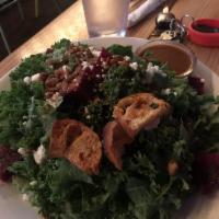 Kale Salad · Local beets, pumpkin seeds, goat cheese, and baked Migas.
