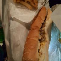 Cheese Steak Hoagie · Our original steak & cheese on a toasted bun. Try with hot peppers today!