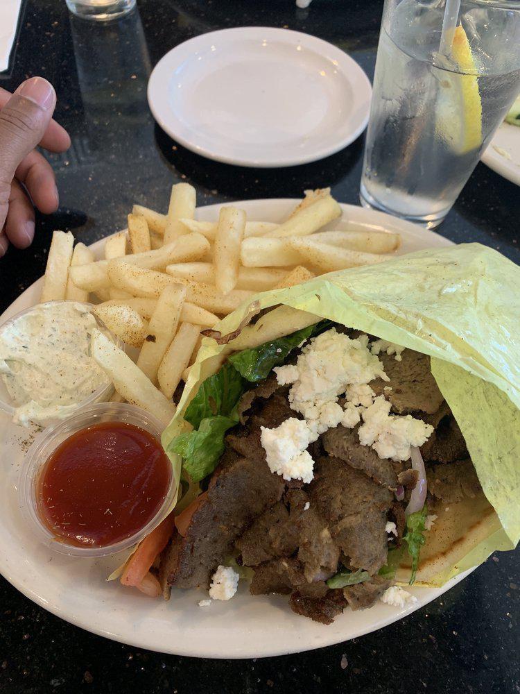 Gyro and Feta Sandwich · Classic gyro with lamb, beef, feta, and side of tzatziki sauce.