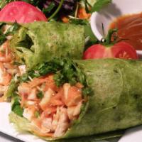 Spicy Thai Chicken Wrap · Chicken breast, carrots, cucumber, daikon sprouts, cilantro, lettuce and spicy-sweet Thai sa...