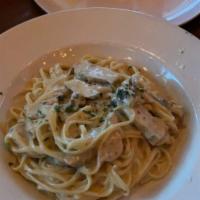 Chicken Alfredo · Grilled chicken breast, creamy Alfredo sauce, linguine pasta, topped with Italian parley. Su...