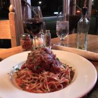Spaghetti and Meatballs · Freddie p's family recipe, large enough to fill up house marinara, spaghetti topped with Par...