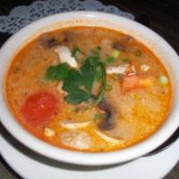 Tom Kha Soup · Spicy lemongrass coconut soup with mushroom, tomato, cilantro and green onion.