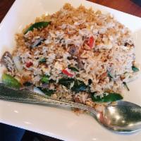 Basil Fried Rice · Jasmine rice wok with eggs, bell pepper, chili and fresh basil.