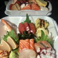 Sashimi Mix · Assorted raw fish and white rice on the side