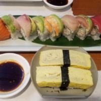 Rainbow Roll · 8 Pieces. Raw slices of fish over California roll.
