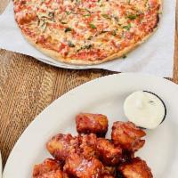 Boneless Wings · Served with bleu cheese dressing.