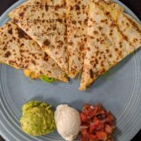 Quesadilla · Bacon, caramelized onion, Monterrey, сheddar cheeses served with sour cream, salsa and guaca...