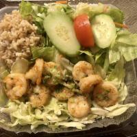 Lighter Garlic Shrimp · Hawaiian style garlic shrimp served with a scoop of brown rice and tossed salad.