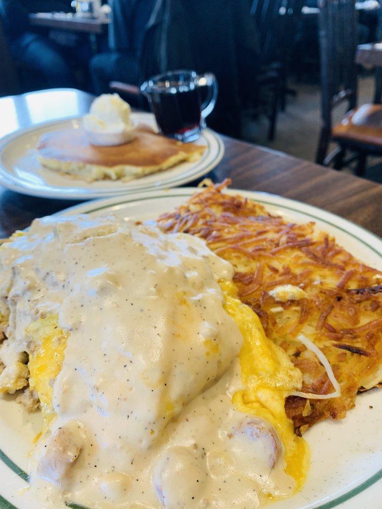 Country Omelette · Savory sausage and Tillamook cheddar cheese smothered in our homemade country sausage gravy.