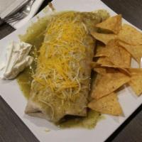 Chile Verde Burrito · Filled with pork in a roasted tomatillo sauce, rice, beans, onions and cilantro.