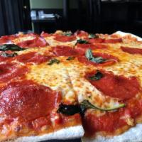 Bronx Bomber Pizza · Tomato sauce, mozzarella, deli sliced pepperoni and basil.