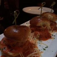 Meatball Sliders · Veal, beef and pork meatballs, roasted tomato sauce and mozzarella.