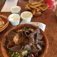 Gyros Salad · Greek Salad with Gyros Meat.  Choose from Small, Medium or Large (Large Serves 3-4). Salads ...